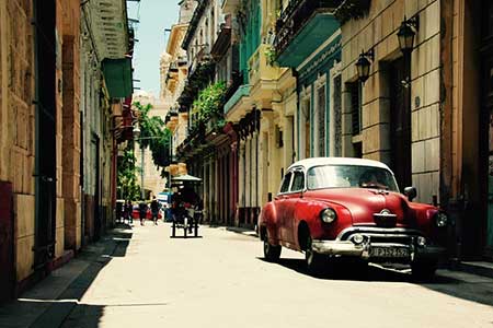Old red car in the streets of Havana, Cuba