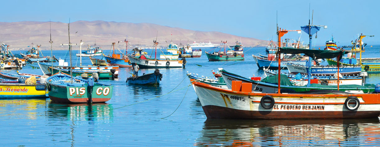 Boats in the sea with Black Watch in the distance, Peru