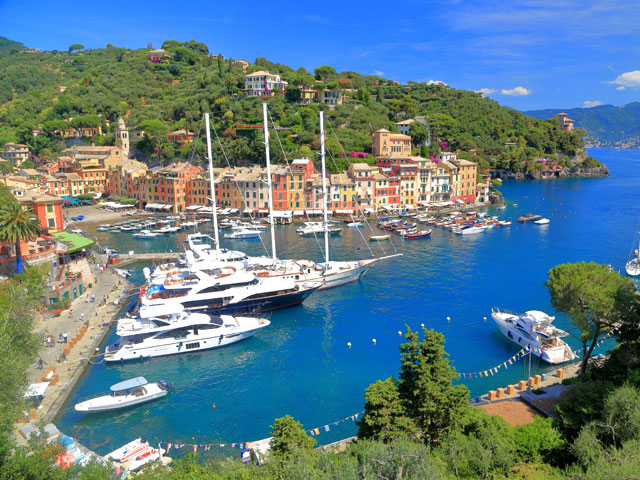 Luxury yachts inside the harbour of Portofino, Italy