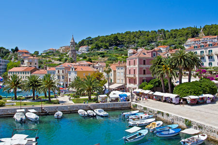 Hvar city scape with boats and mountain range, Croatia Hvar city scape with boats and mountain range, Croatia