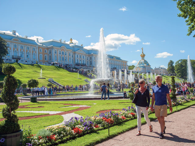 Couple walking around Peterhof in St. Petersburg, Russia