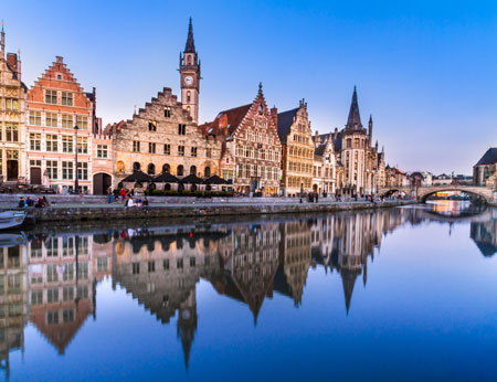 Medieval buildings overlooking the Graslei harbor on Leie River, Ghent, Belgium