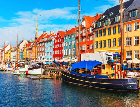 Nyhavn district - famous landmark in Copenhagen in a summer day, Denmark