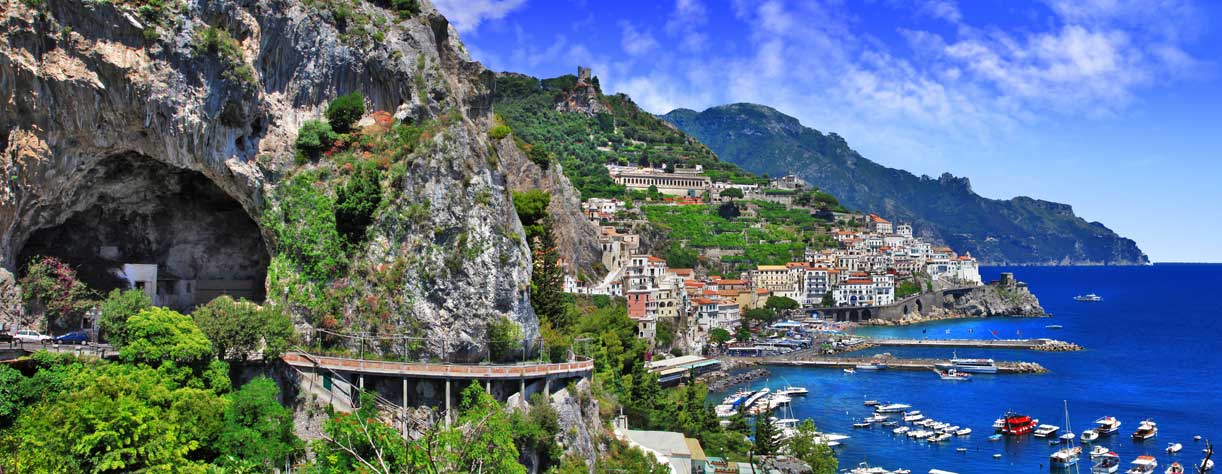 Italy scenic Amalfi coast view with cave and serpantine road