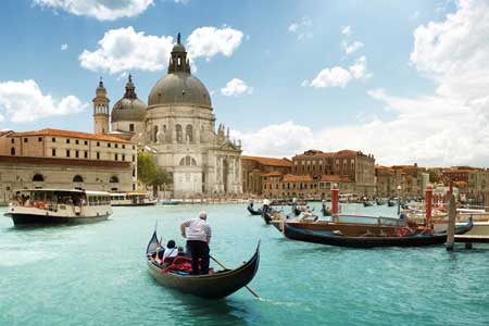 Venice boats with clear blue sea, Italy