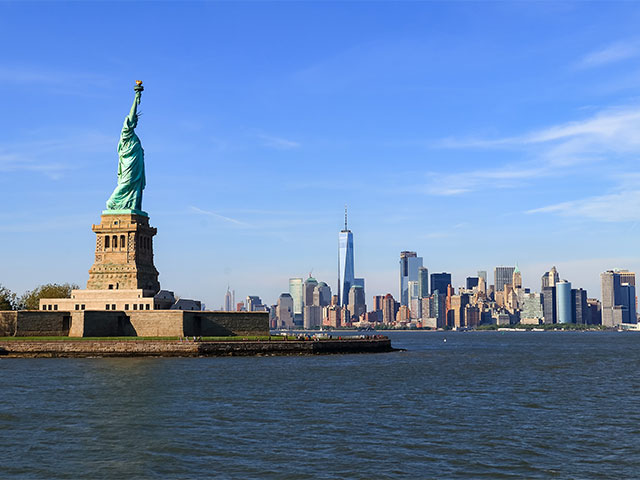 Statue of liberty and downtown New York, USA