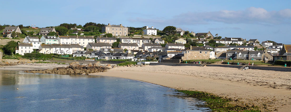 Porthcressa beach and Hugh Town, St. Mary's Isles of Scilly, Cornwall UK.