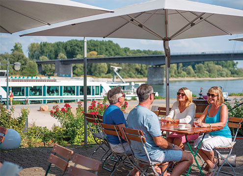 Friends ashore in Speyer, Brabant in the background Tipples & Treasures of the Rhine and Moselle
