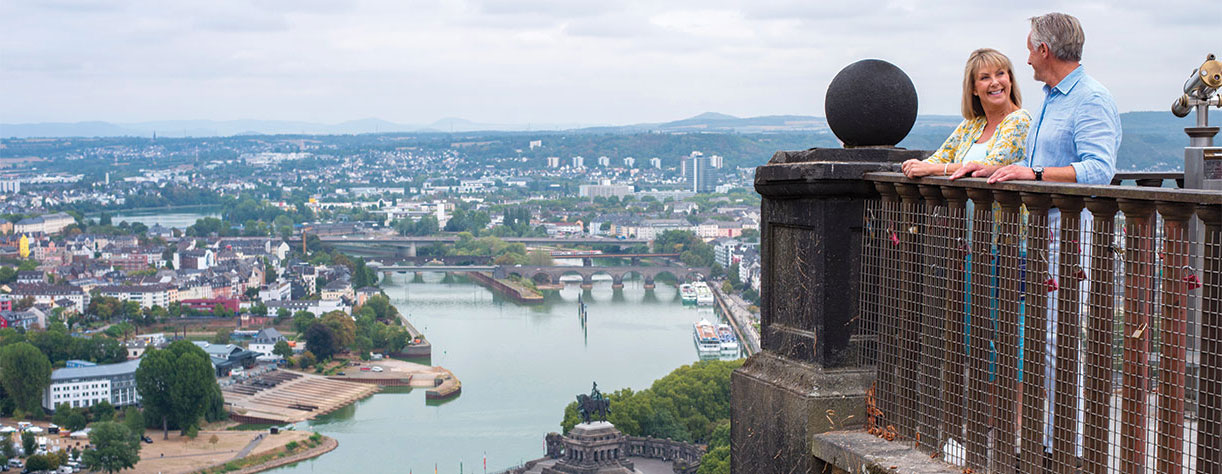 Couple looking out to Koblenz, Germany Couple looking out to Koblenz, Germany