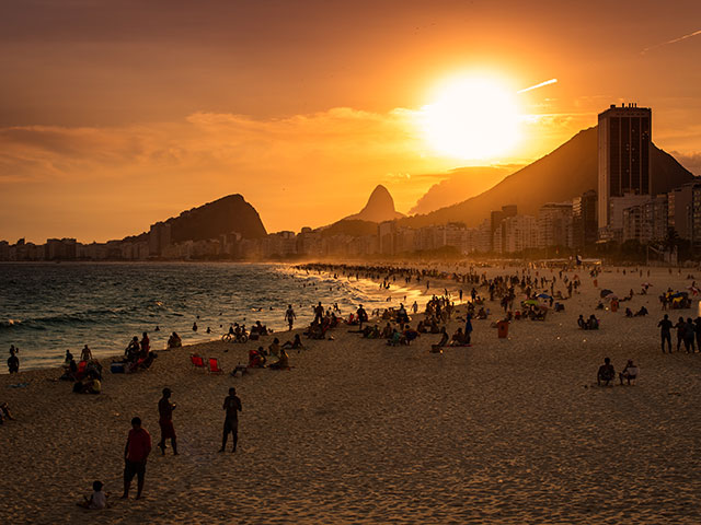 Sun setting over Copacabana beach Sun setting over Copacabana beach