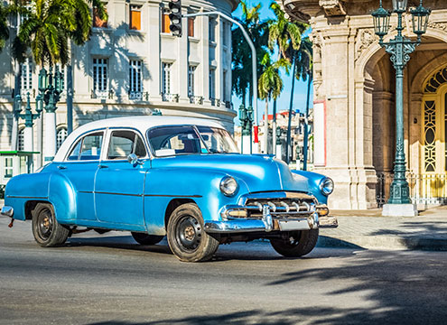 Blue classic car in Havana, Cuba Cultural Caribbean Discovery