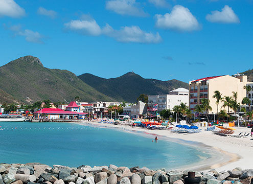 Sublime beach views and mountains in St Maarten Voyage from the Caribbean to the Med