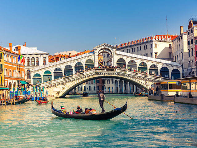 Iconic Gondalas and bridge in Venice