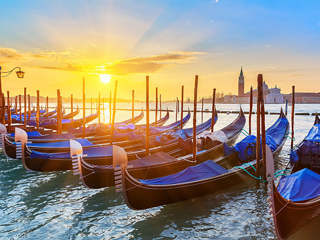 Venice gondalas with stunning sunset Venice gondalas with stunning sunset