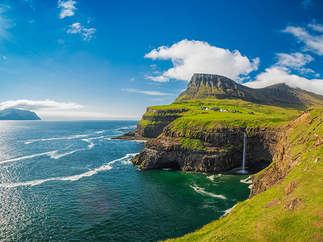  View of Gagadalur with beautiful waterfall, Vagar, Faroe Islands 