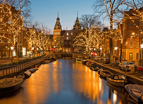 Christmas time in Amsterdam with the Rijksmuseum in Netherlands at twilight Belgium & the Netherlands at Christmas