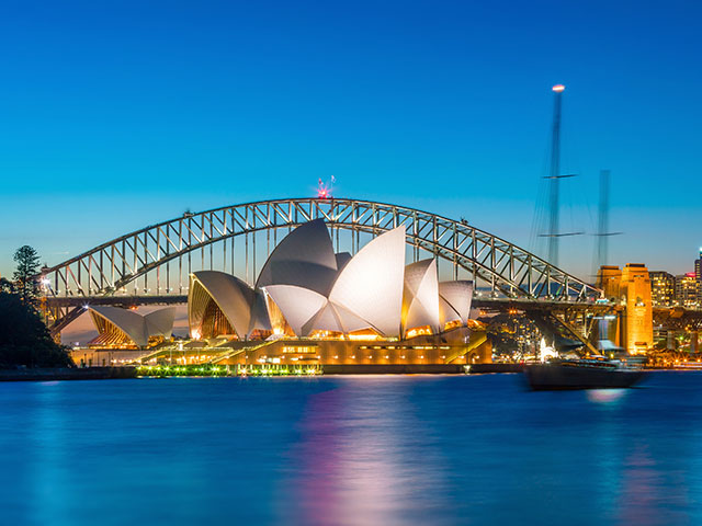 Evening view of the Opera house and harbor bridge, Sydney, Australia