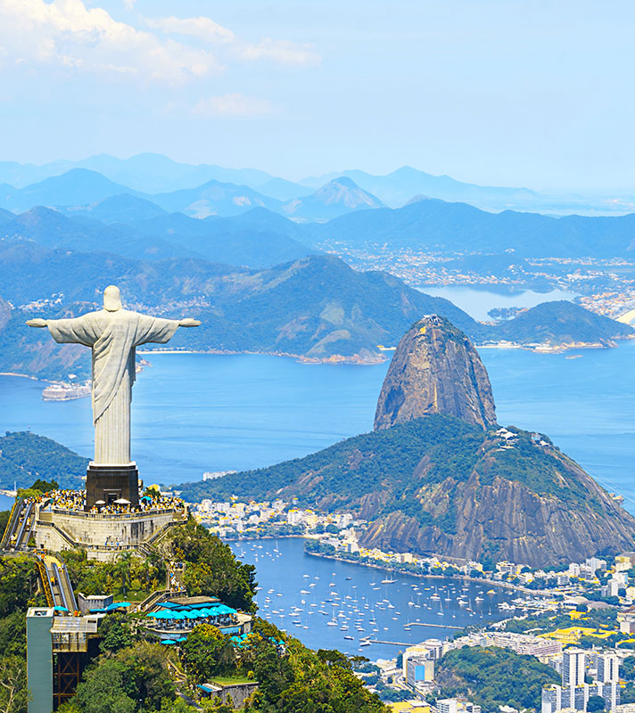 Statue of Christ the Redeemer overlooking Sugar loaf mountain, Rio, Brazil Statue of Christ the Redeemer overlooking Sugar loaf mountain, Rio, Brazil