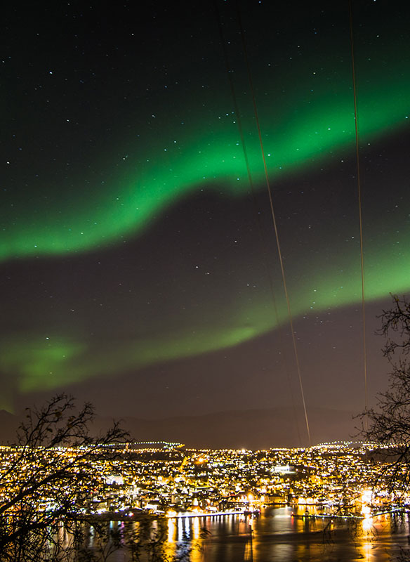 Spectacular Northern Lights over Tromso at night