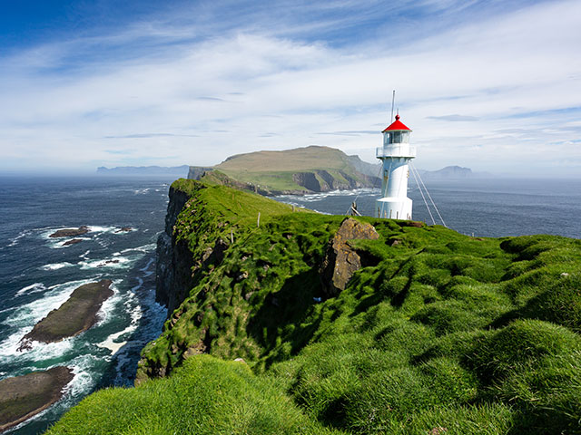 The beautiful lighthouse on Mykines island in Faroe Islands
