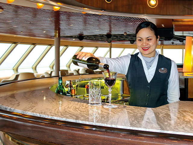 Waitress pouring drinks in The Observatory - Borealis Waitress pouring drinks in The Observatory - Borealis