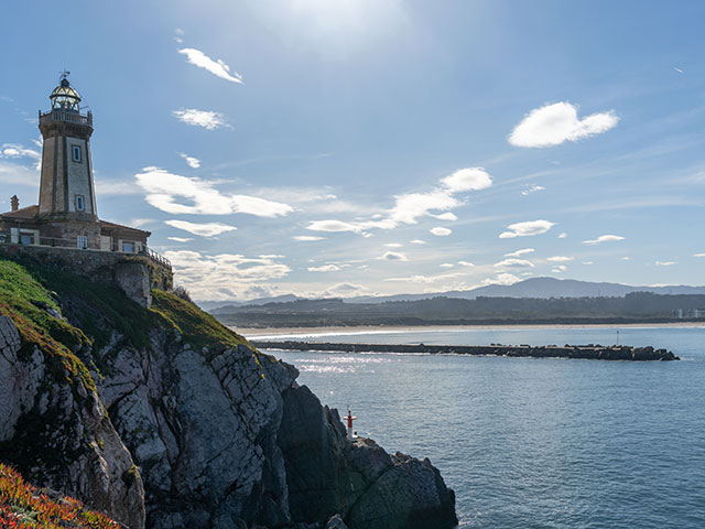The view of the San Juan de Nieva Lighthouse near Aviles, Spain