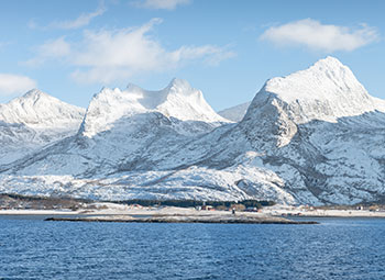 Snow capped Seven Sisters Mountain Range, Norway