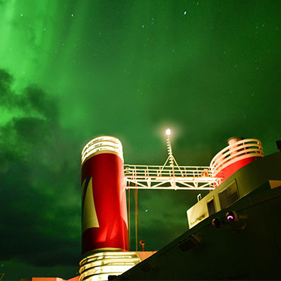 Borealis funnels with Northern lights