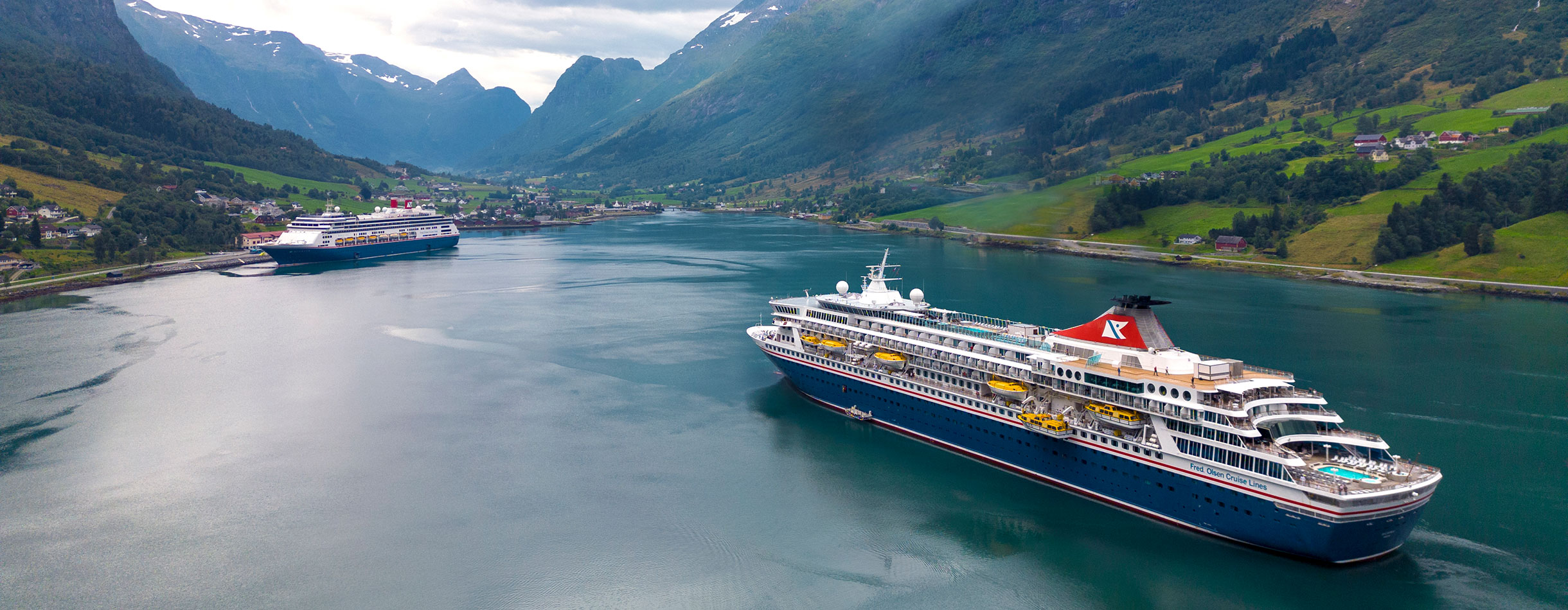 Bolette docked and Balmoral arriving into Olden, during a cruise to Norway