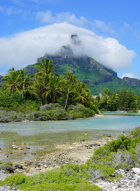 View of the Mont Otemanu mountain reflecting in water in Bora Bora, French Polynesia, South Pacific