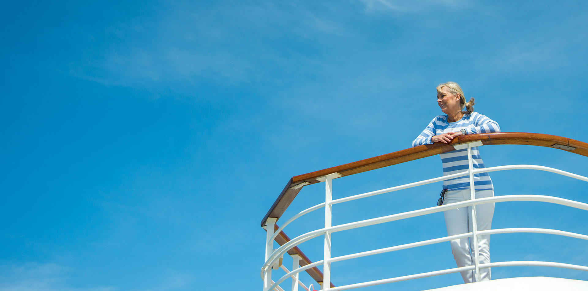 Guest looking out to sea from on board Balmoral