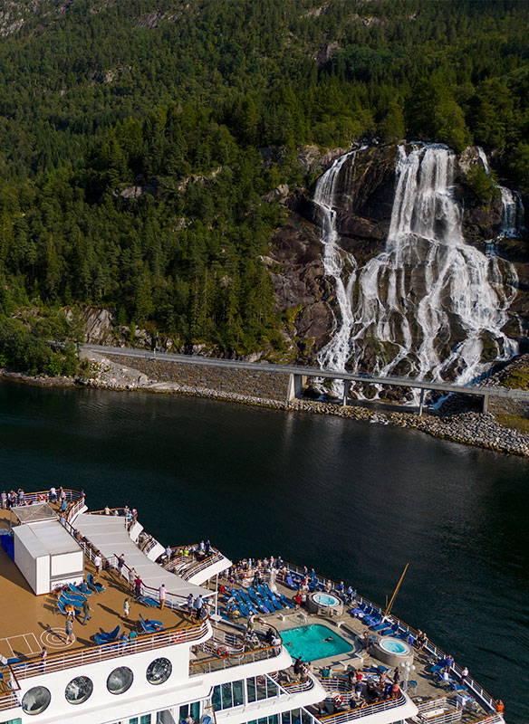 Balmoral cruising by Furebergsfossen waterfall, Norway