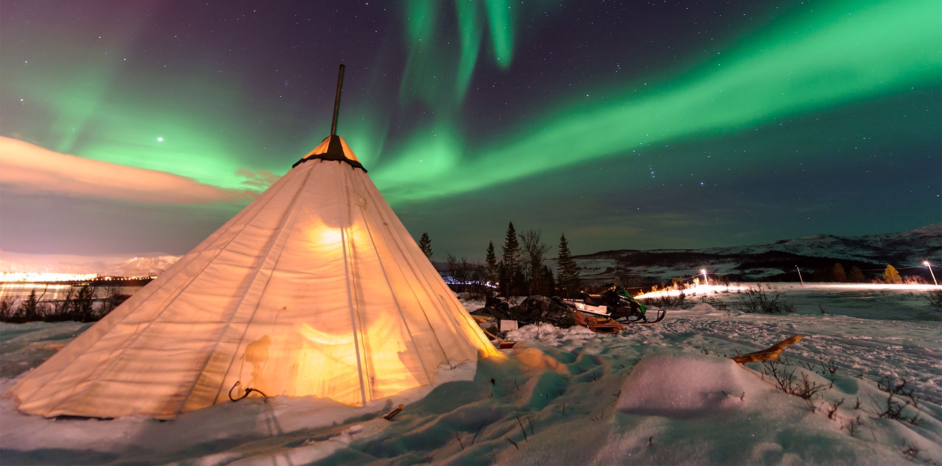 Northern lights over Sami tent, Tromso, Norway