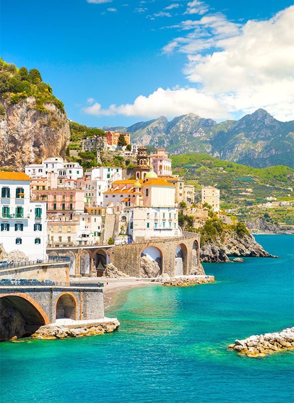 Morning view of Amalfi cityscape on coast line of mediterranean sea, Italy