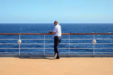 Guest looking out to sea from deck