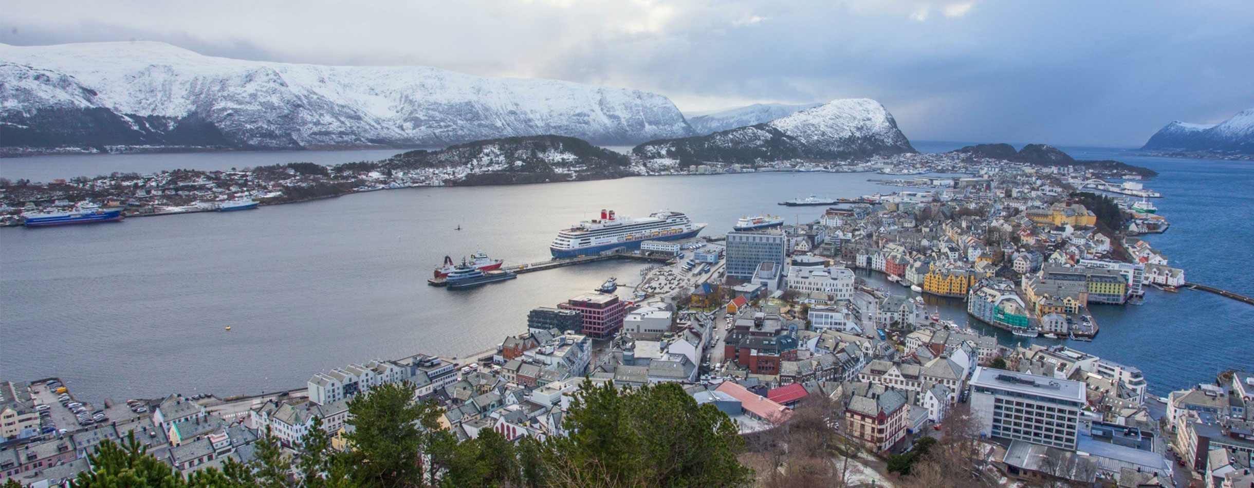 A wide view of the Balmoral ship docked in Alesund, Norway