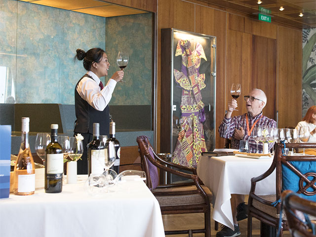 Our on board Sommelier and guests enjoying a wine tasting 