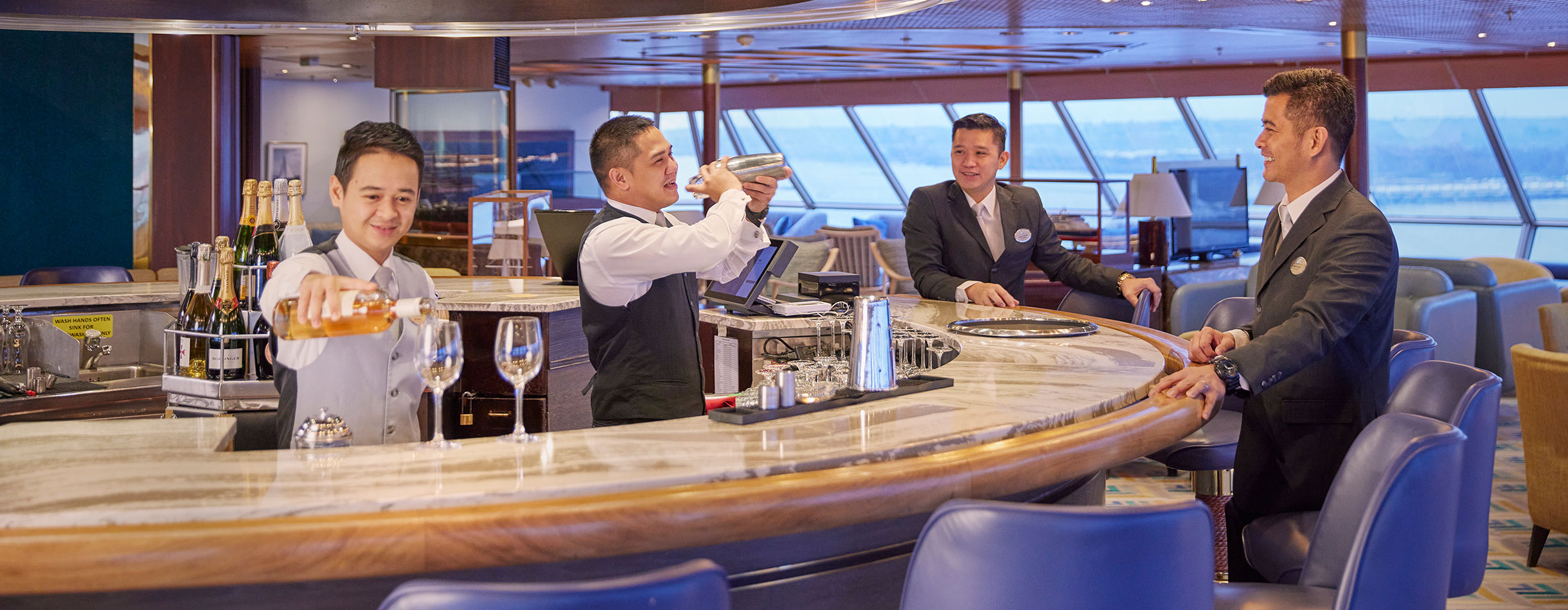 Bar Team preparing drinks in the Observatory, Bolette