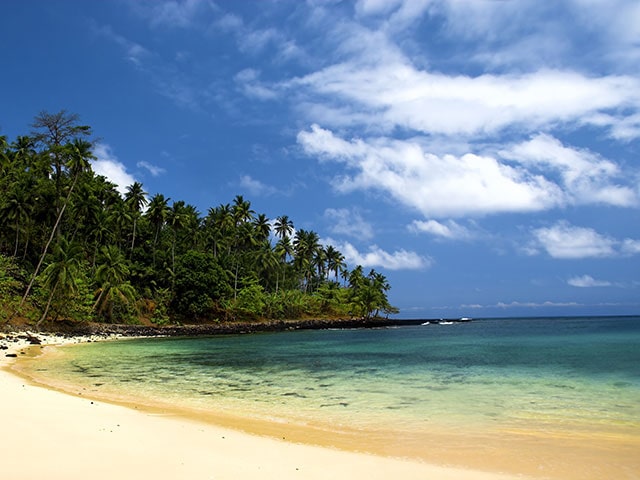 Beautiful beach with a great blue sky and turqoise water in Sao Tome