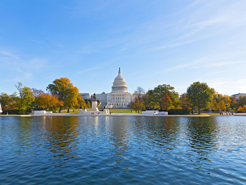Capitol Hill panorama with reflection pool in late autumn, Washington DC, USA