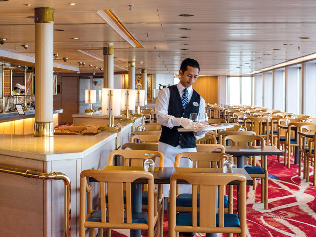 The View lounge on Borealis, showcasing large windows overlooking the ocean