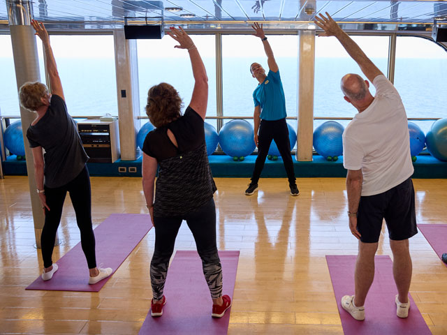 Guests enjoying a Stretch and Tone class in the Borealis gym