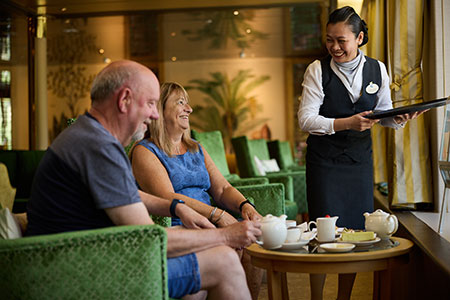 Bar Team member talking to guests