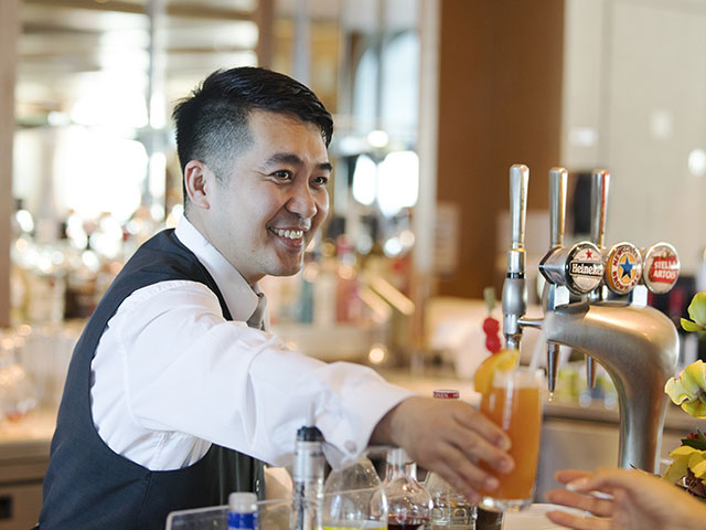 Bar Team serving a mocktail