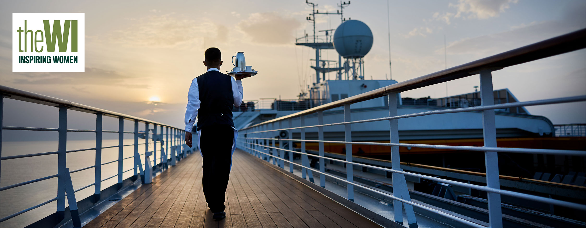Waiter walking along the deck