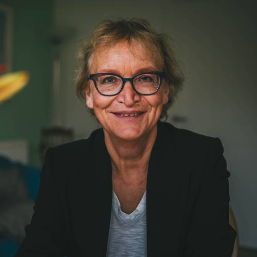 Sarah Rees Jones, guest speaker, poses in a professional portrait
