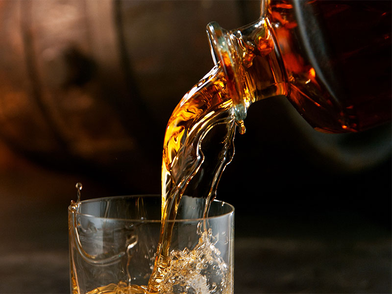 Whisky being poured into a glass