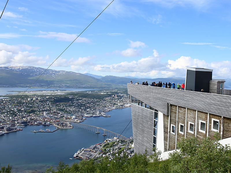 Panoramic view of Tromso city from Mt. Storsteinen in summer, northen Norway. A famous view from the top of fjellheisen cable car station, Tromso.