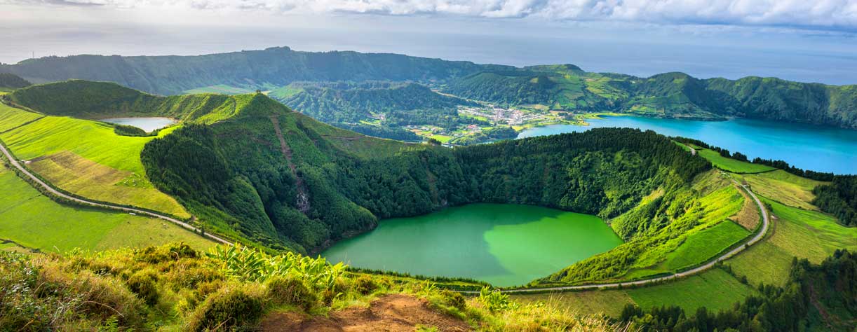 Mountain landscape with hiking trail and view of beautiful lakes Ponta Delgada, Sao Miguel Island, Azores, Portugal
