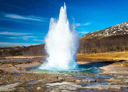 Geyser erupting, cruise to Iceland 